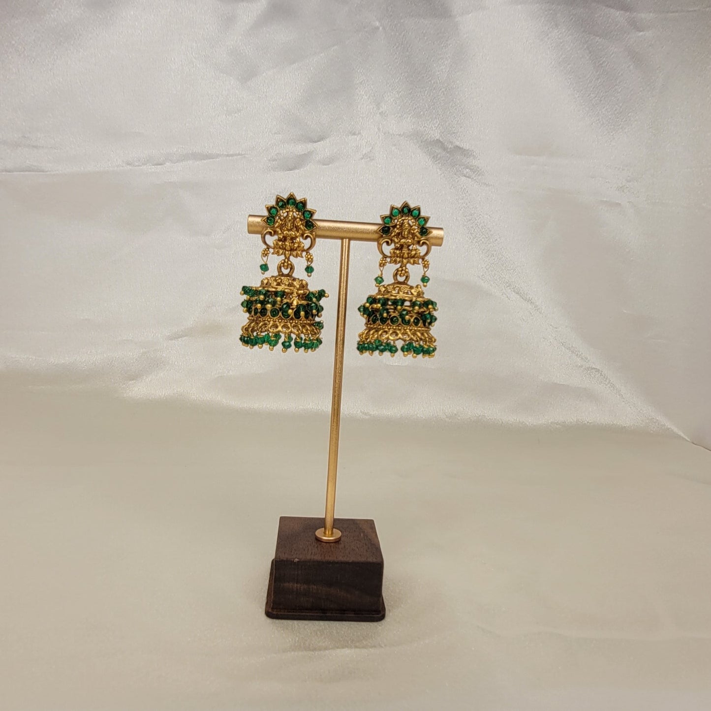 Antique Gold-Tone Floral Jhumka Earrings with Emerald Green Beads
