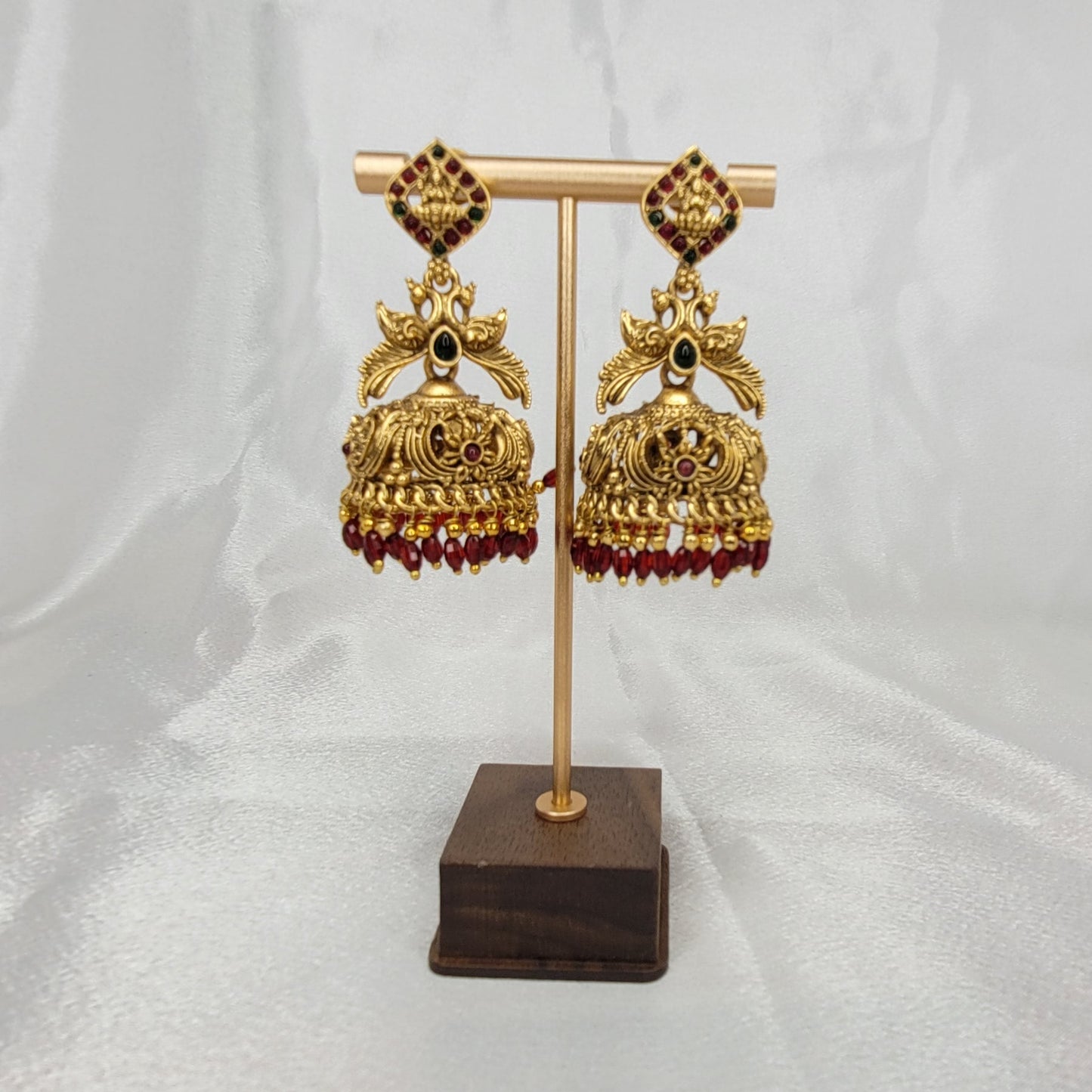 Antique Gold Jhumka Earrings with Red Bead Drops