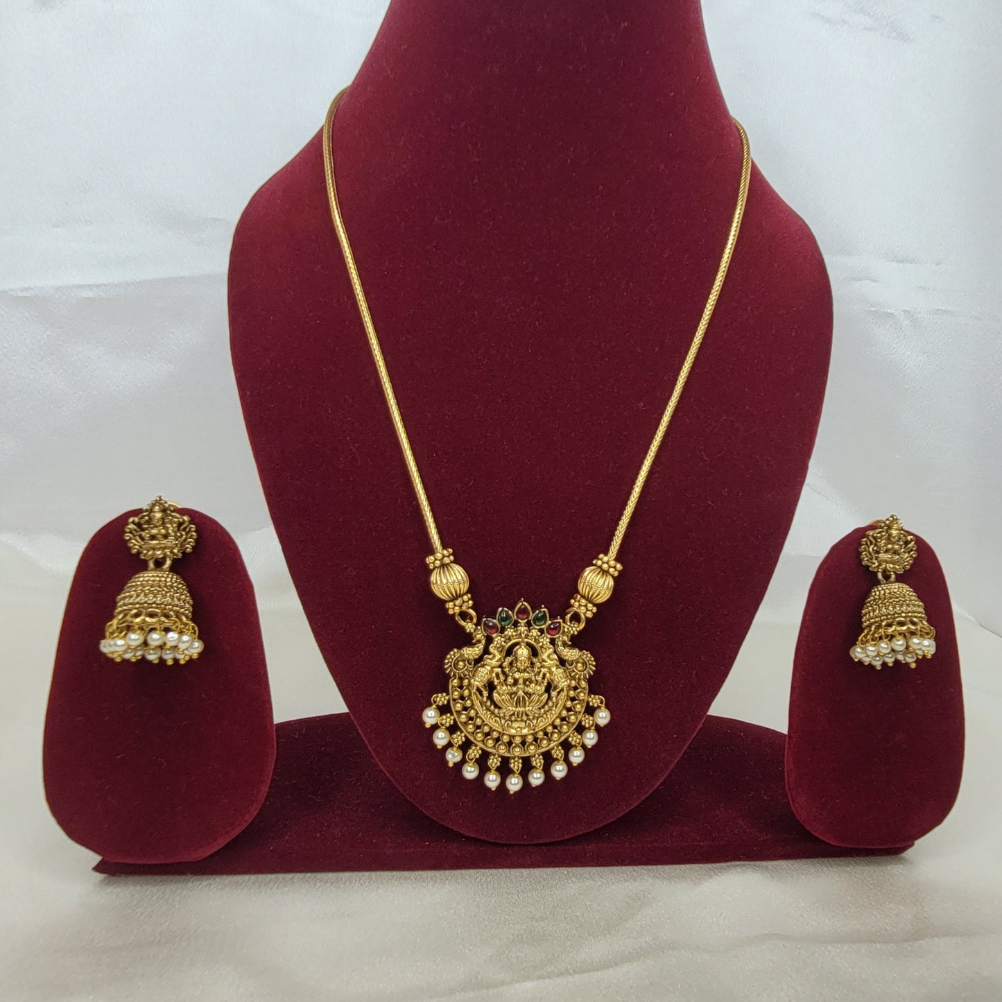 Antique Gold Lakshmi Temple Pendant Necklace Set with Pearl Jhumkas