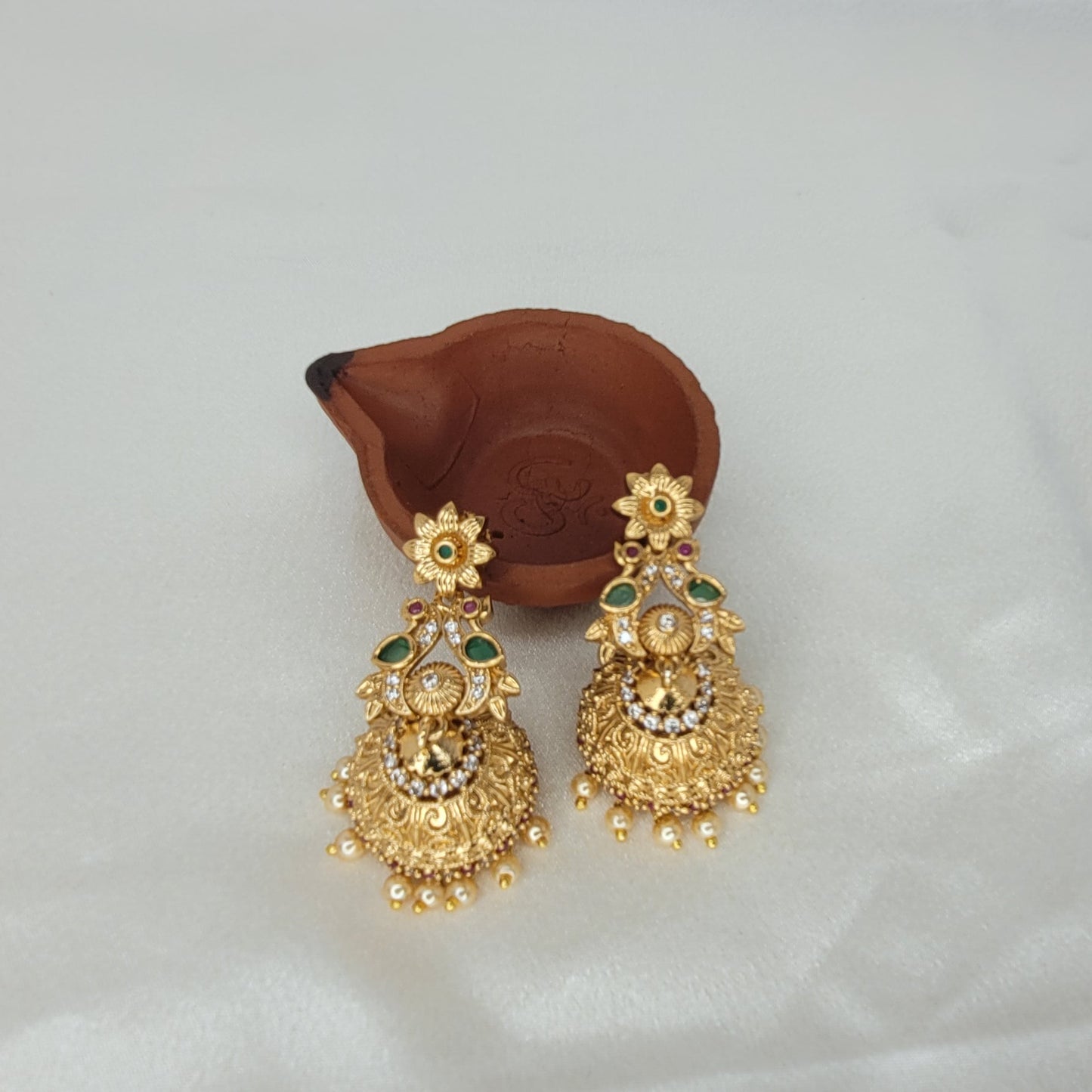 Antique Gold Peacock Temple Jhumka Earrings with Green Stones