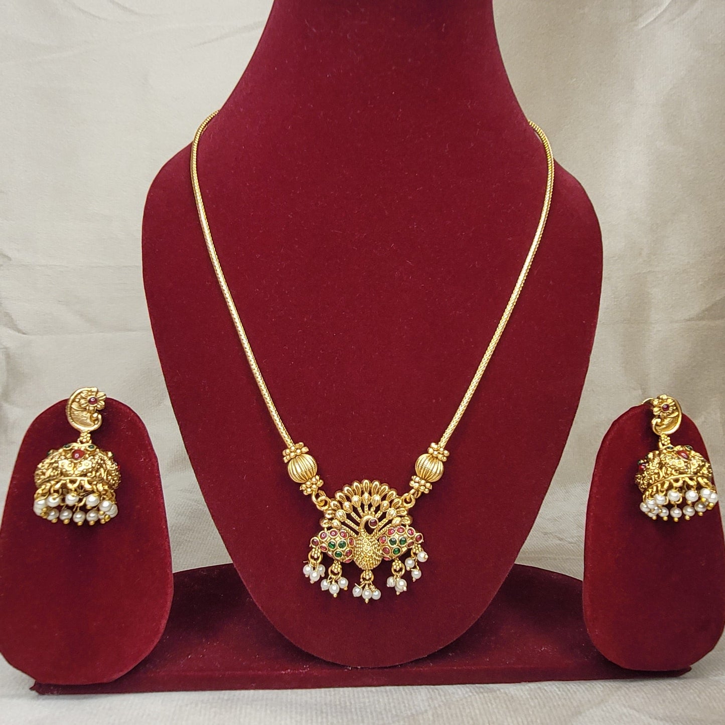 Antique Gold Peacock Pendant Necklace Set with Jhumka Earrings