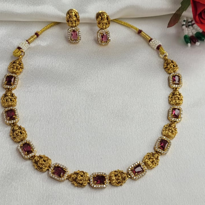 Antique Gold Lakshmi Motif Choker Necklace Set with Red Gem Stones